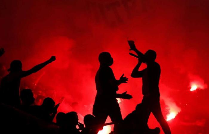 Tear gas, shops vandalised, cars set on fire and arrests: PSG fans clash with Paris police after Champions League defeat - in pictures