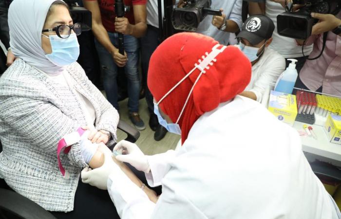 Pictures … The Egyptian Minister of Health receives an experimental vaccine...
