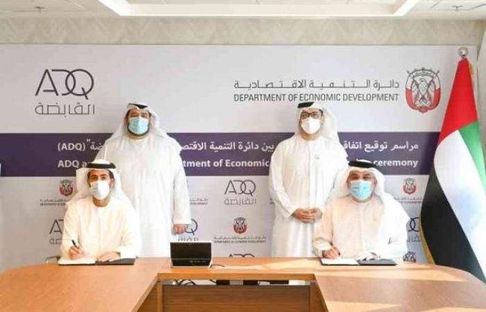 A cooperation agreement between “Abu Dhabi Economy” and “Holding” – the...