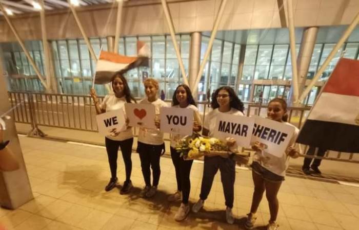 Love signs greeting Mayar Sherif at Cairo International Airport. Pictures