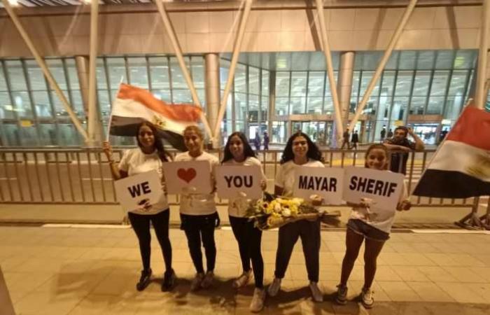 Love signs greeting Mayar Sherif at Cairo International Airport. Pictures
