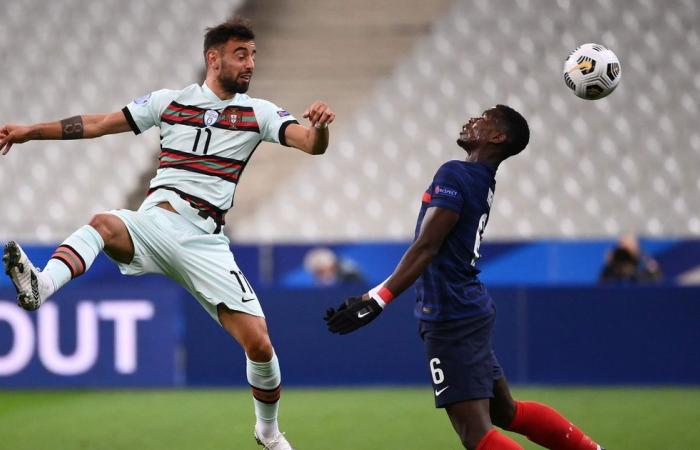 Paul Pogba and Bruno Fernandes compete against each other in the...