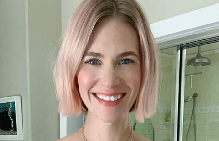 January Jones poses in a pink bra for Breast Cancer Awareness...