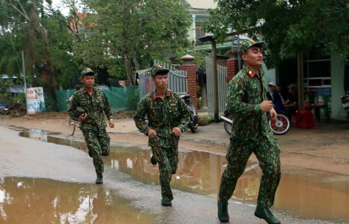 Vietnam rescuers find nine bodies in search for landslide survivors
