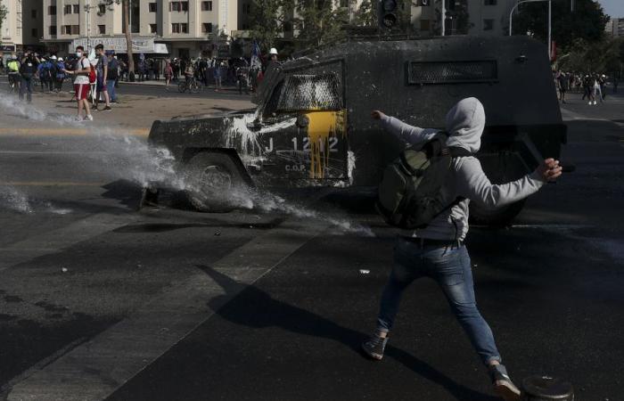 Demonstrations and riots are registered in Santiago and other cities in...