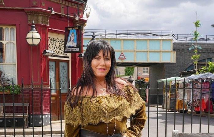 EastEnders star Jessie Wallace almost comes out of her brightly colored...