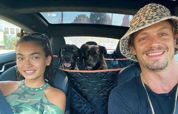 Joel Kinnaman shows off chiseled chest while walking two dogs with...