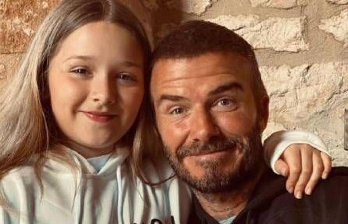 The picture of David Beckham kissing the 9-year-old daughter on the...