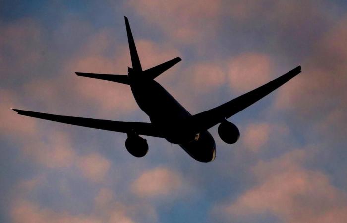 Thirteen people infected on one flight resulted in 59 cases