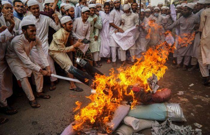 Muslims around the world burn French flags and pictures of Macron...