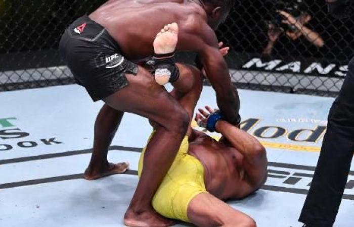 Anderson starts better, but is knocked out; executioner cries with...