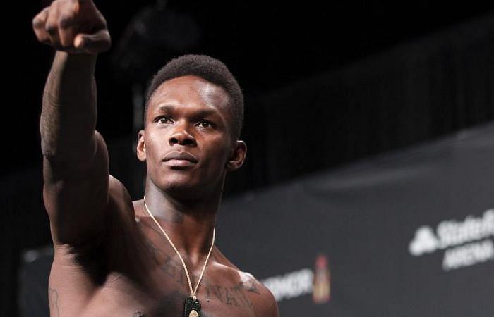 UFC middleweight champion Israel Adesanya calls Kevin Holland his “fan” after...