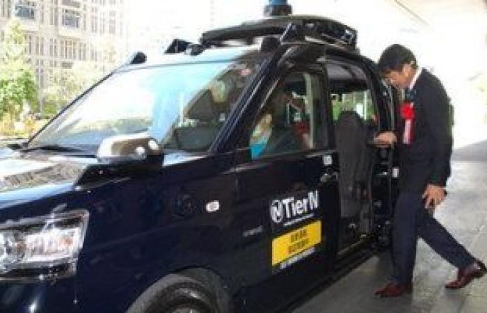Japan tests a driverless taxi around the government office building in...