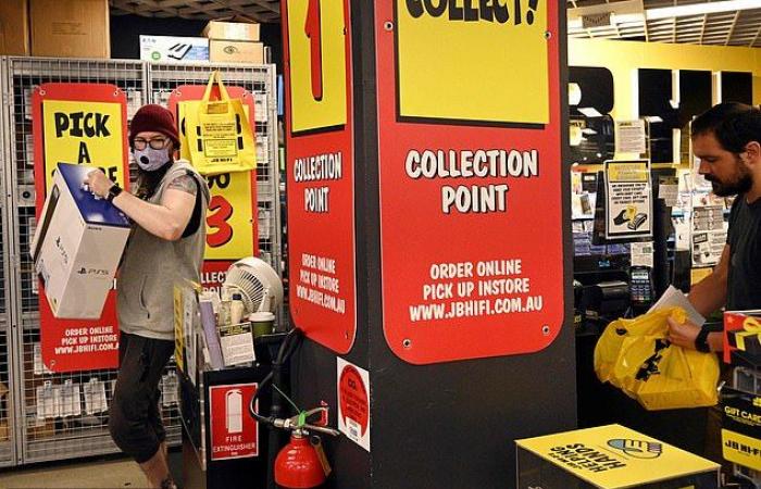Gamers dive into JB Hi-Fi to buy the latest Playstation 5...