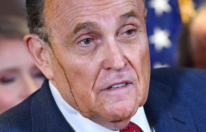 Trump attorney Rudy Giuliani runs hair dye down his face