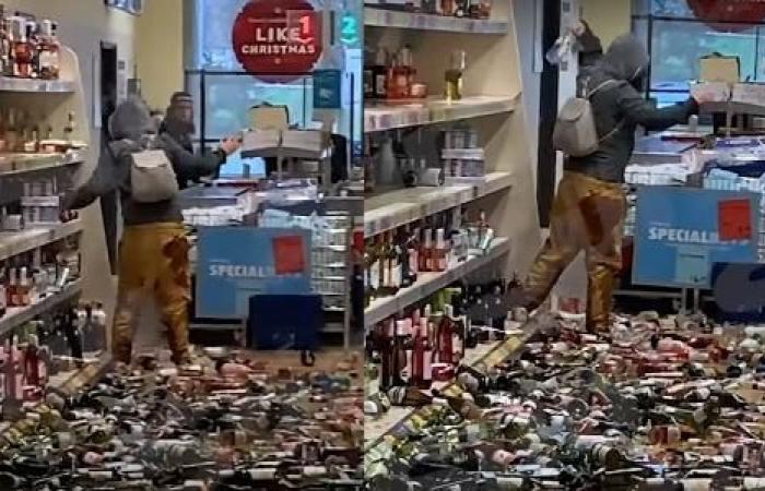 woman destroys 500 bottles of drink at market