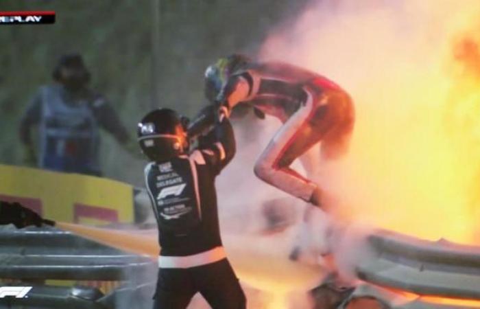F1 driver Romain Grosjean escapes after several seconds in the fire