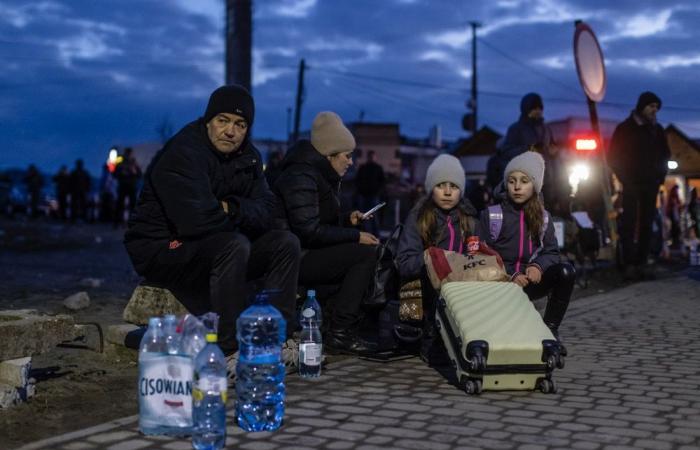 Ukrainian civilians pour out in search of shelter and safety