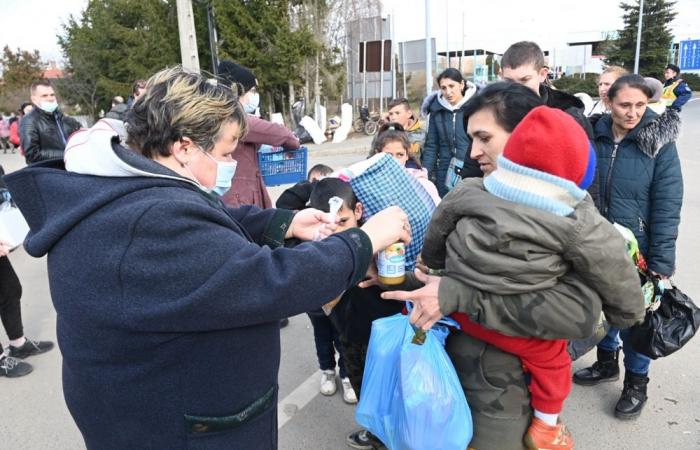 Ukrainian civilians pour out in search of shelter and safety