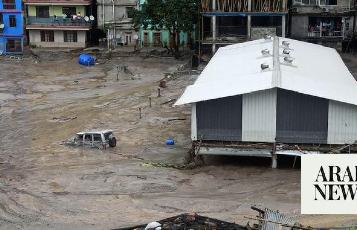 Himalayan glacial lake flooding kills 14, more than 100 missing in India