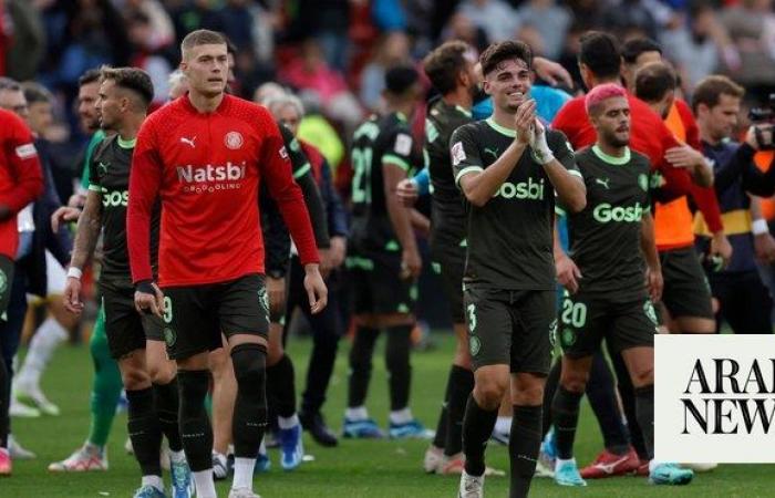 Girona win again to keep Spanish league lead after 2-1 comeback at Rayo