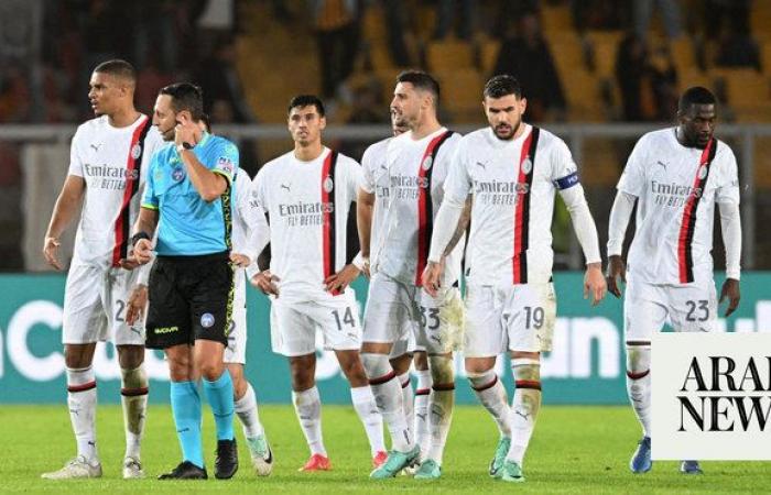 AC Milan again let slip a two-goal lead in a 2-2 draw at Lecce, Juventus beat Cagliari to go top