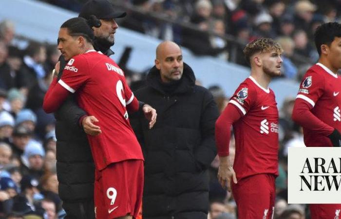 Liverpool hit back to hold Man City, end Etihad winning streak