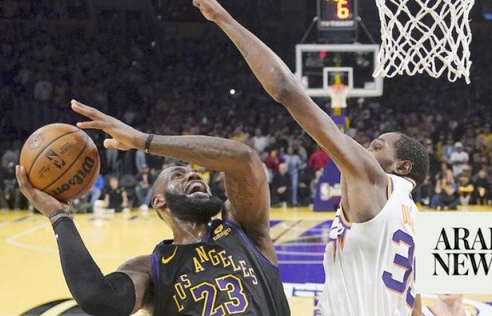 James and Lakers down Suns while Bucks romp past Knicks