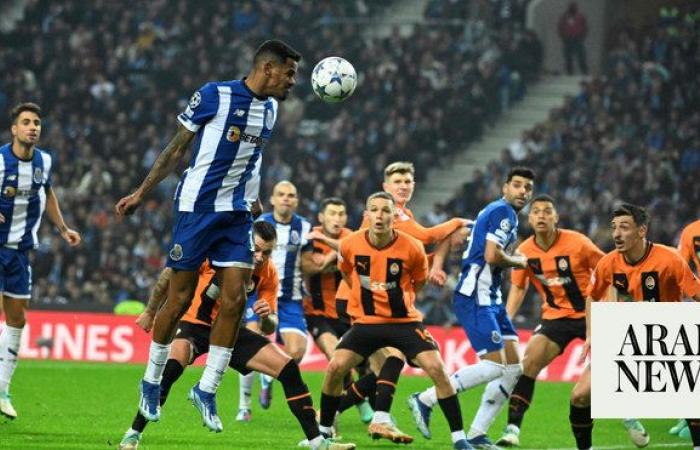 Paris Saint-Germain advances in tense finish to Champions League group. Porto also into round of 16