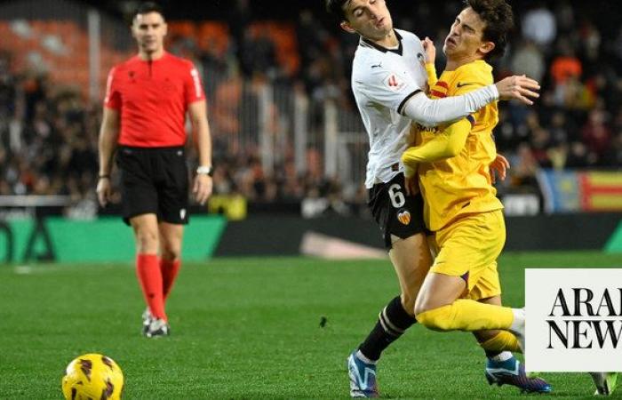 Barcelona held at Valencia for third game without a win. Sevilla fire coach Diego Alonso