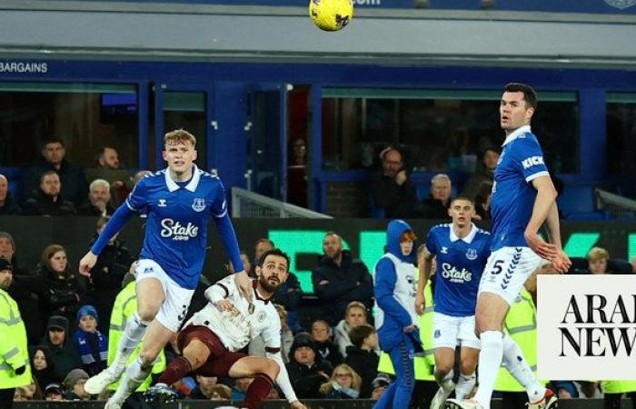 Man City battle back to beat Everton on return to Premier League