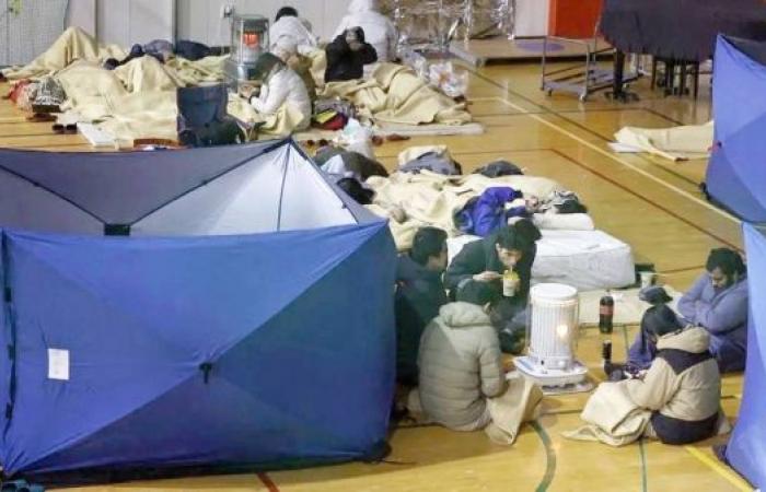 Japan earthquake: Thousands in shelters overnight after tsunami warnings