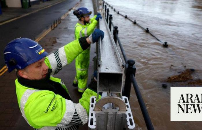 Britain hit by flooding after heavy rain swells major rivers