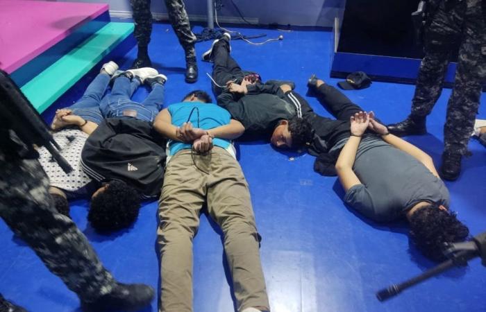 Ecuador TV studio taken over live on air by masked people brandishing guns