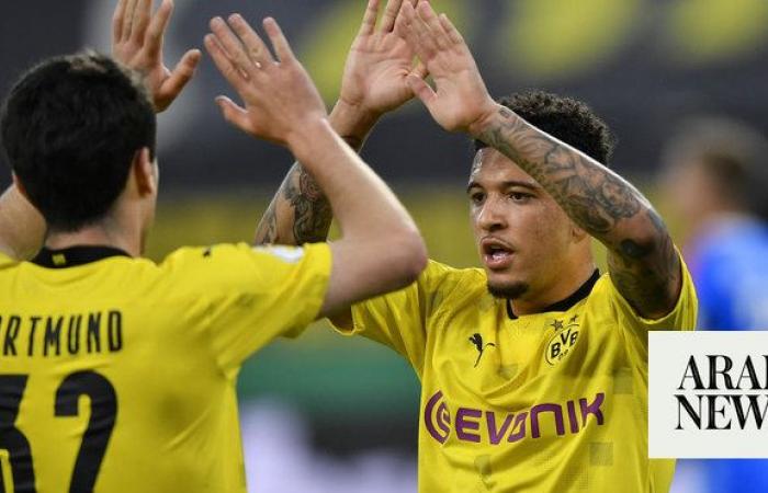 Sancho escapes Man Utd exile to rejoin Dortmund on loan