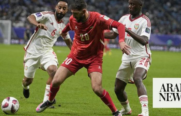 Palestinian team boosts chances of advancing in the Asian Cup after 1-1 draw with UAE