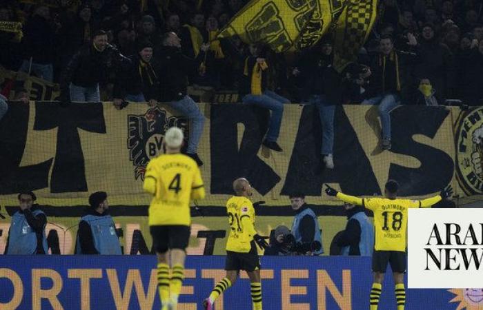 Malen scores brace as Dortmund beat Cologne despite chocolate coin protest