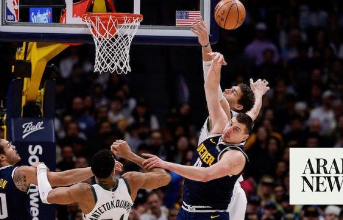 Nuggets down Bucks to spoil Rivers opener; Wolves roll back Thunder