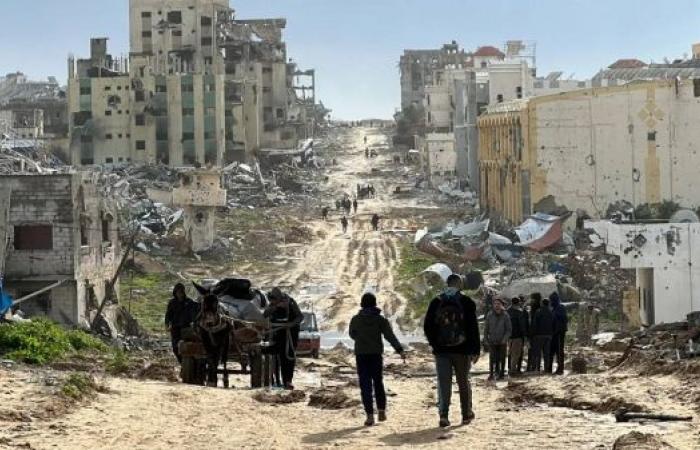 Palestinian surgeon says Israeli snipers killed civilians trying to flee besieged Gaza hospital 