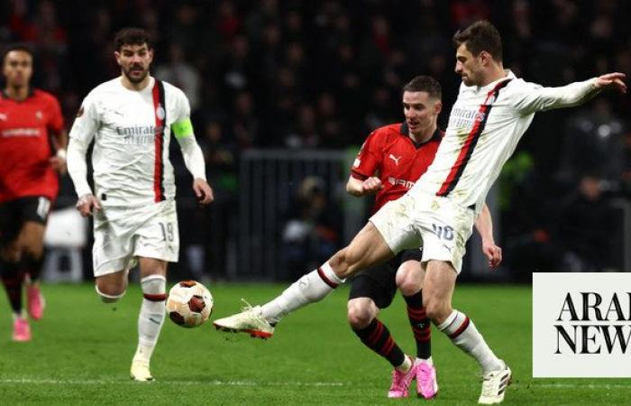 Milan and Benfica book spots in Europa League last 16