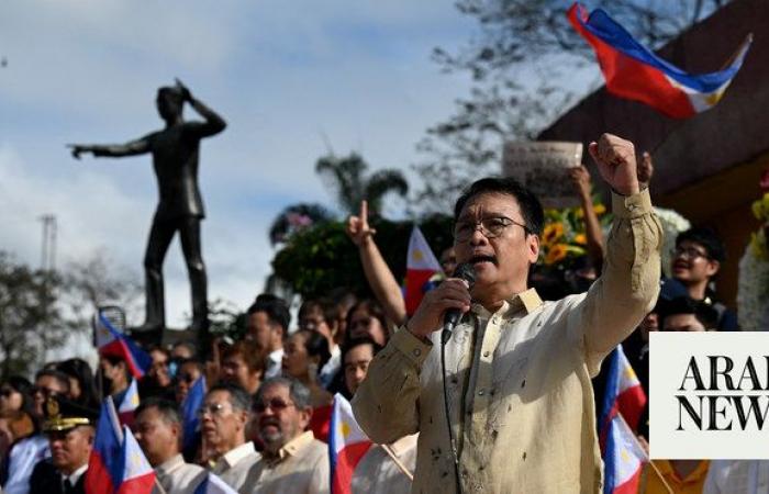 Philippine protesters say ‘never again’ on anniversary of anti-Marcos uprising