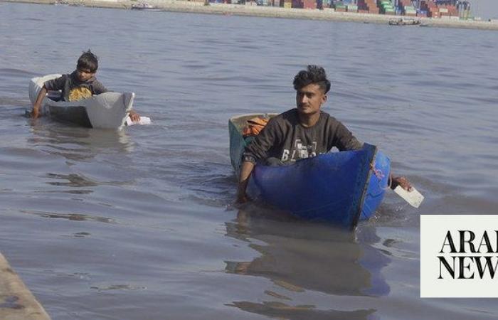 As fuel prices soar, Karachi’s young fishermen make perilous journeys on makeshift plastic boats
