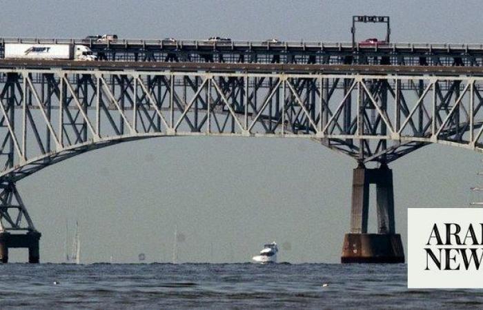 Cargo ship hits Baltimore’s Key Bridge, bringing it down. At least 7 people believed to be in water
