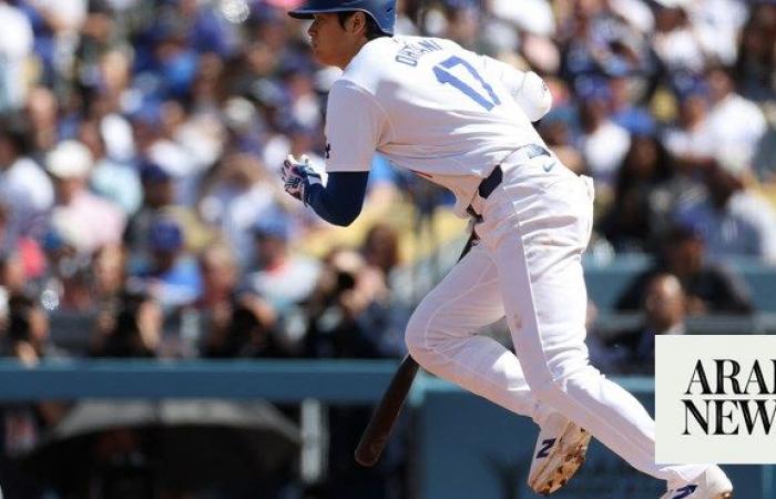 Ohtani wins in Dodgers home debut, Rangers open Major League Baseball title defense with victory