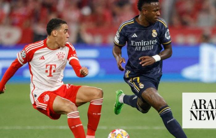 Vinicius hits brace as Real Madrid come back to snatch draw at Bayern