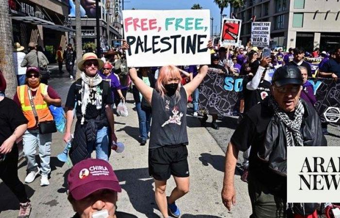 Pro-Palestinian banners. Blazing Olympic rings. Workers’ May Day rallies confront turbulent times