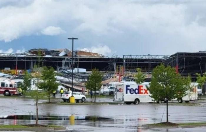 Dozens trapped as tornado collapses Michigan FedEx depot