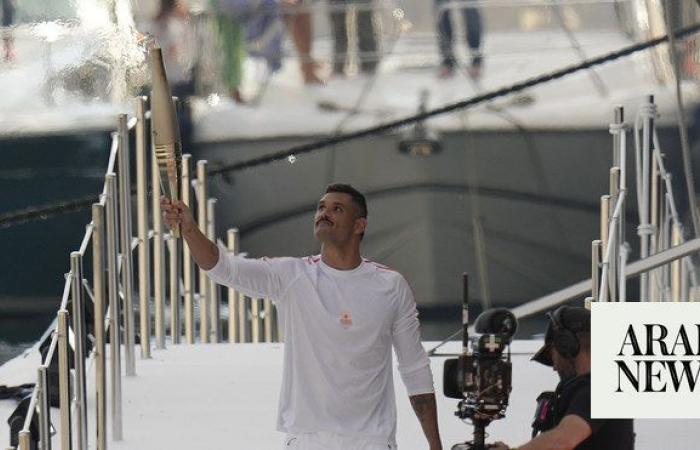 Olympic torch begins journey across France after festive welcome in Marseille before Summer Games