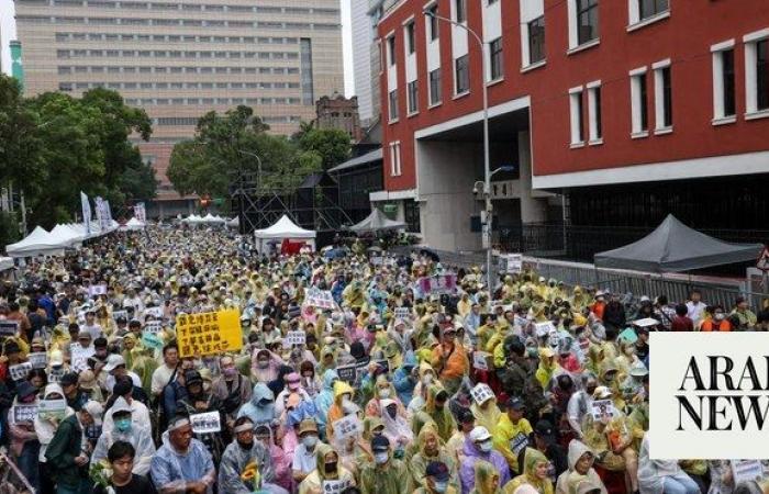 Thousands protest as Taiwan’s parliament passes contested reforms