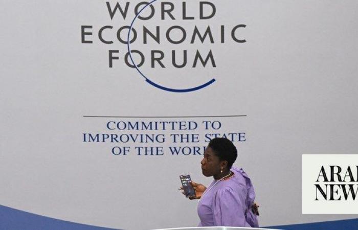 WEF warns of political risk, says global economy is brightening